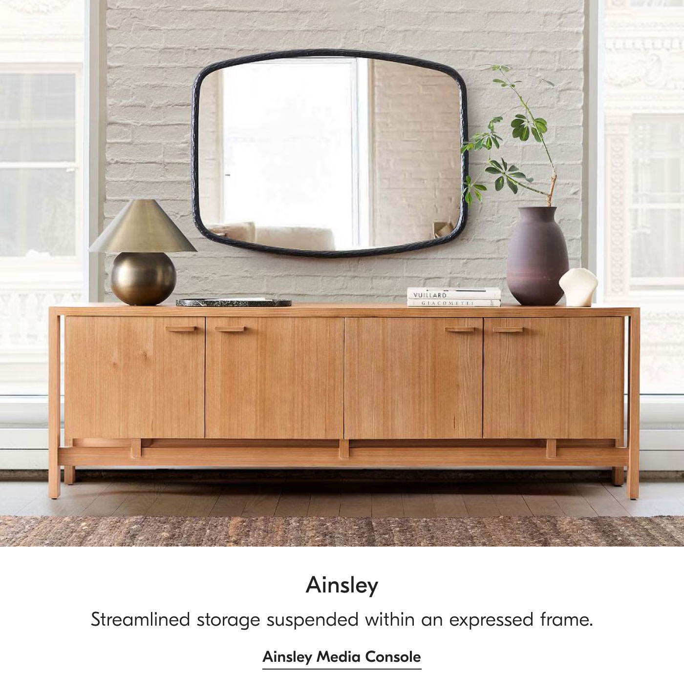 Ainsley - Streamlined storage suspended within an expressed frame. Ainsley Media Console
