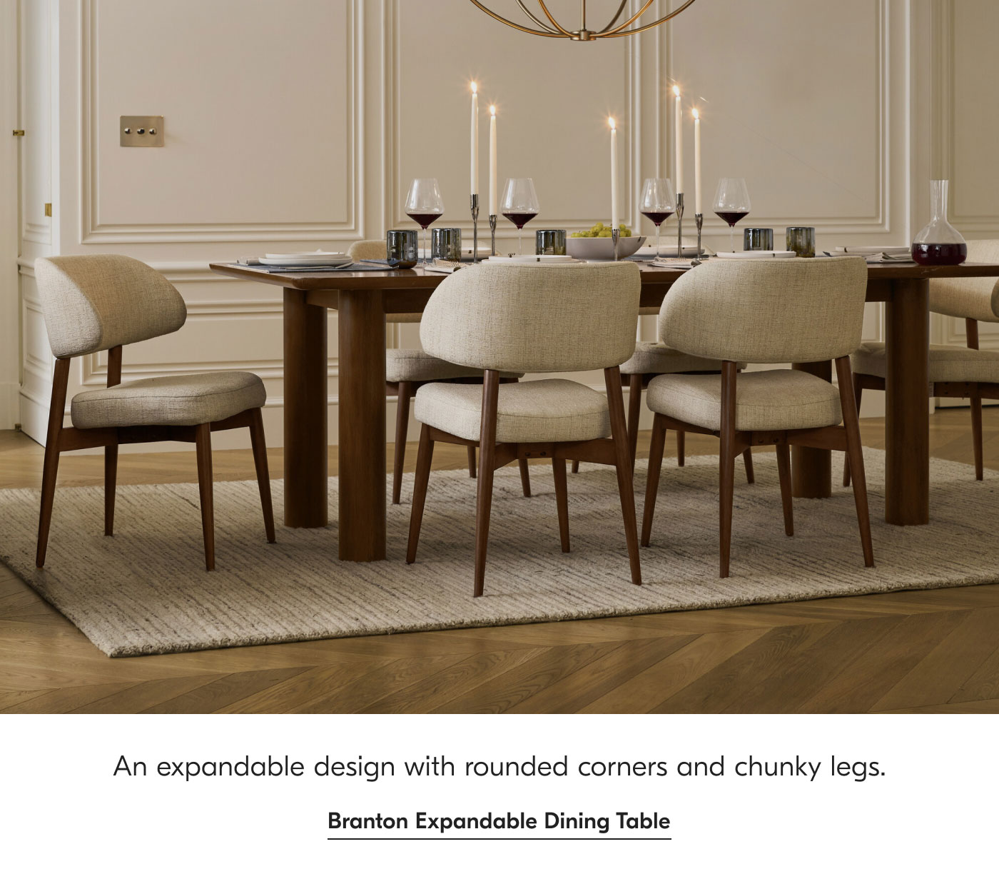 An expandable design with rounded corners and chunky legs. Branton Expandable Dining Table