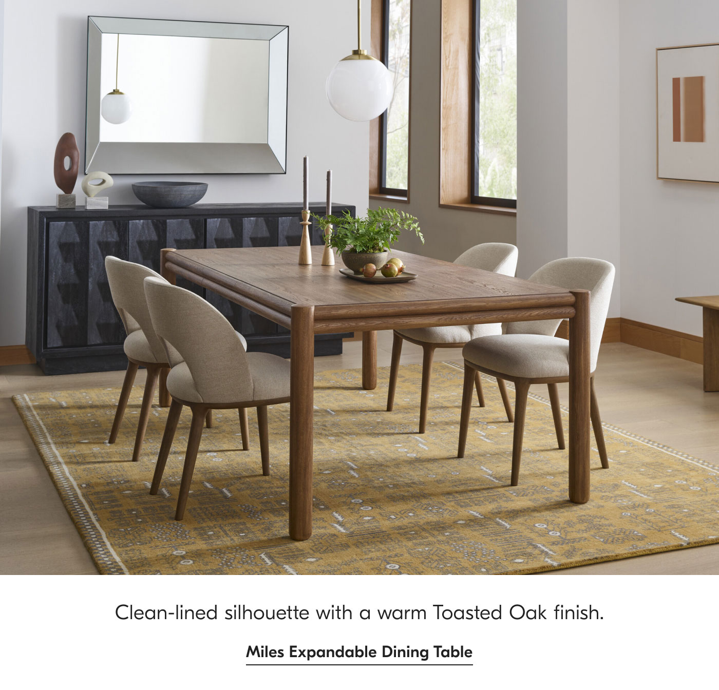 Clean-lined silhouette with a warm Toasted Oak finish. Miles Expandable Dining Table