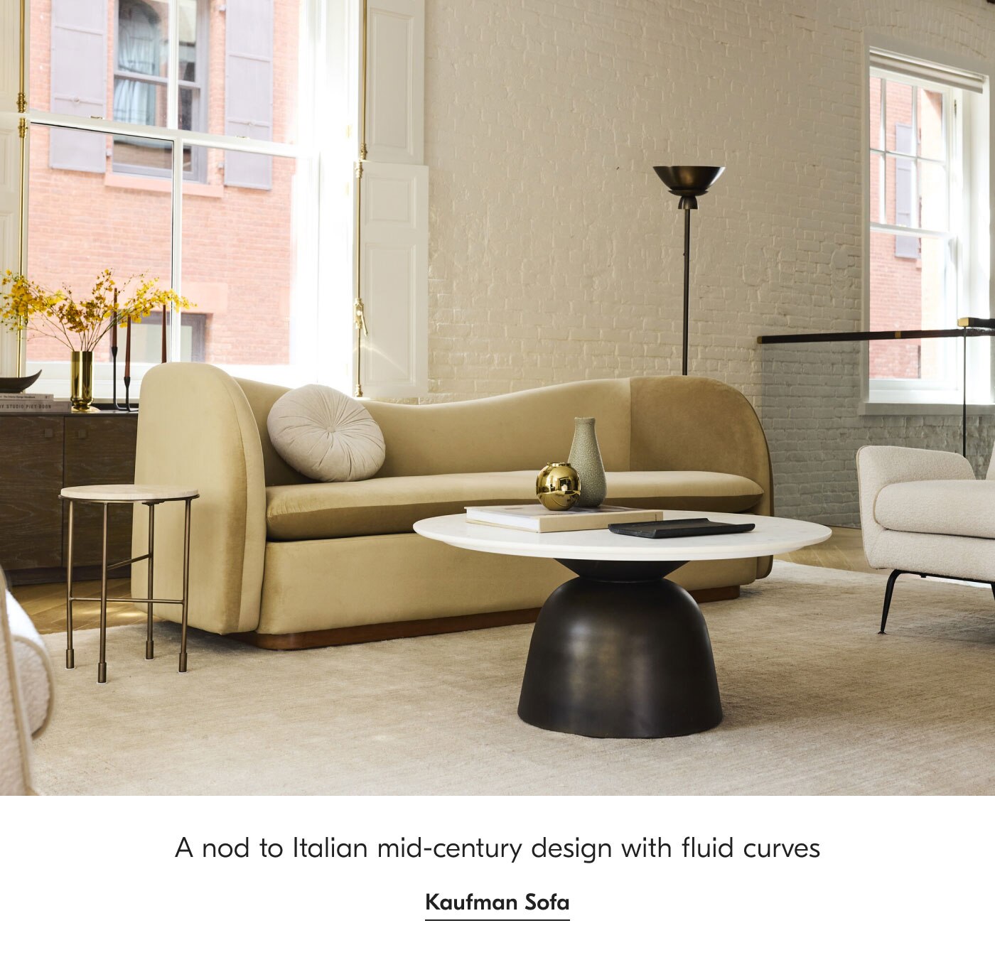 A nod to Italian mid-century design with fluid curves - Kaufman Sofa